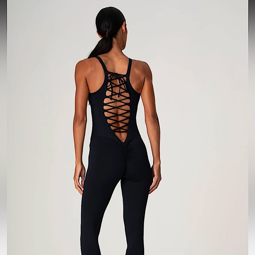 Coco on the Go unitard 
Size small